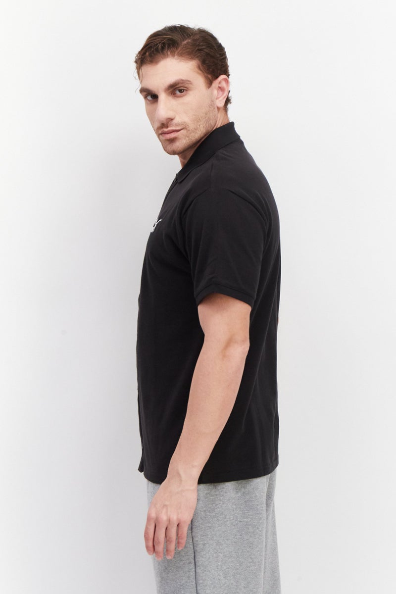 PUMA قمصان بولو تدريبية بشعار العلامة التجارية للرجال بتصميم مريح، أسود - Image 4